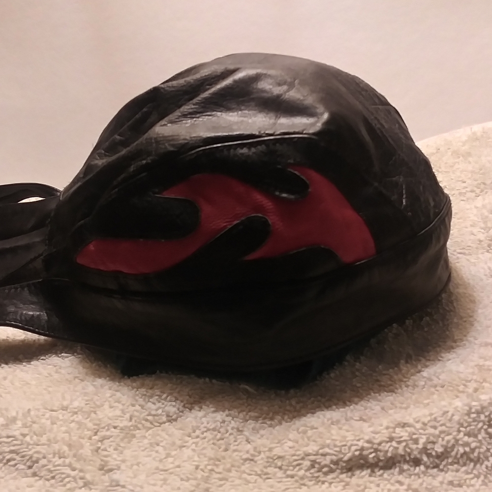 Leather cap for motorcycle riding.